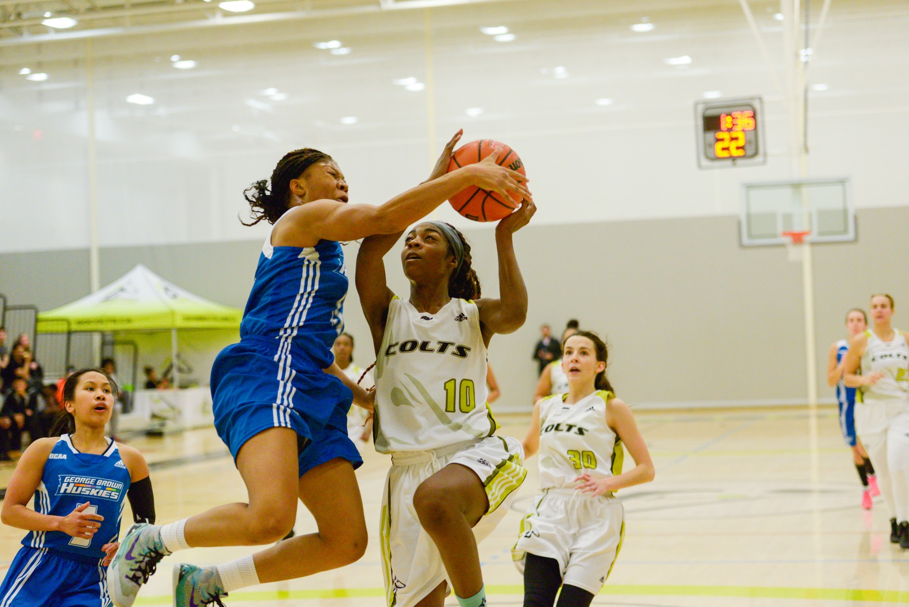 Colts forward Yasmeen Smith goes to the basket and tries to score against a George Brown player